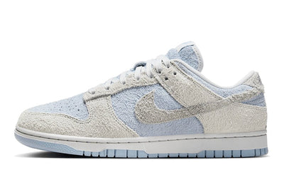 Ein beliebter Nike Dunk Low Light Armory Blue Photon Dust. - Valued